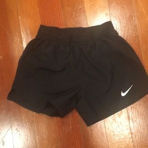 Girls Black Nike running shorts